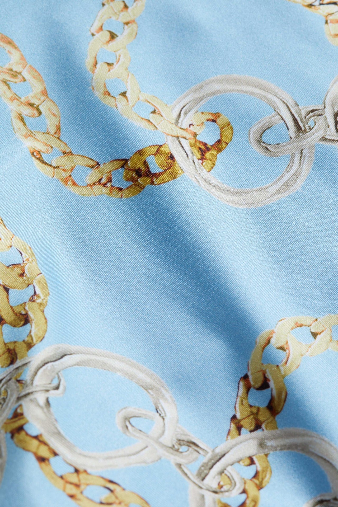 Lisa Plunge One-Piece Swimsuit in Sky Blue Multi Chain | L'AGENCE online